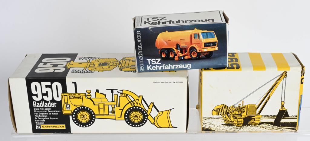 LOT OF DIECAST CONSTRUCTION TOYS MIB: Includes TSZ Kehrfahrzeug Street Sweeper, 950 Radlader Wheel Loader and 594 Rohrverleger Pipelayer. New Old Stock. Boxed Largest 12" Excellent