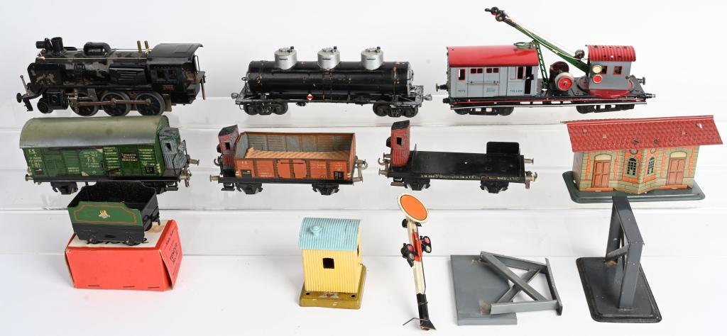 LOT OF TRAIN ENGINE, CARS, & ACCESSORIES: Lot includes Sakai Train Engine, Marklin Shed, and more pieces. Conditions vary