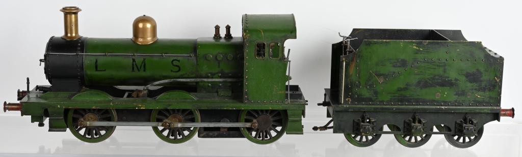 LIVE STEAM 3 GA TRAIN ENGINE & TENDER: Hand Built European style 3 gauge Live Steam Engine and Tender. Very heavy all metal construction. Very well built and detailed. This is a working model. All original condition. 36"