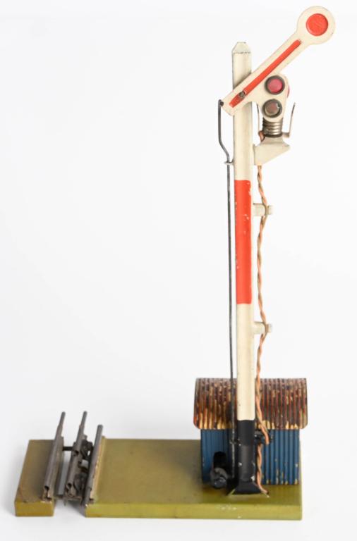 MARKLIN LIGHTED SIGNAL w/ SHED: Original Marklin Lighted Signal with Shed. All original. Has 3 rail adjustable track. 11" Excelelnt