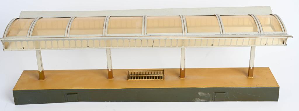 MARKLIN TRAIN PLATFORM: Pre-War Marklin Train Platform. All original with celluloid inserts. Still has very nice paint. Has a few loose solder joints. 28"x8" Excellent