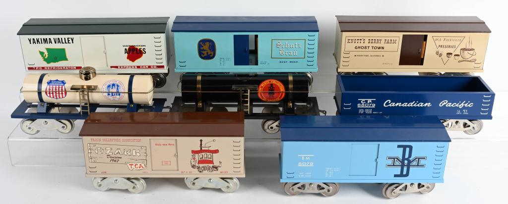 8- McCOY TRAIN CARS: Includes Canadian Pacific Car, Schutz Brau, Knotts Berry Far, BM Car, TCA Toonerville Trolley Car, 1954 TCA Tank Car, Tin Plate Collection Tank Car has loose dome, and Yakima Valley Car. All Excellent