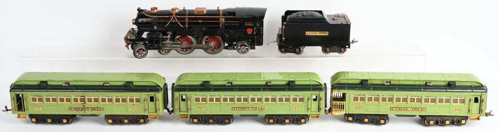 LIONEL 393E & 384 TENDER w/ 3 PASSENGER CARS: Original Lionel standard gauge 393E Locomotive with 384 Tender. Comes with 424 Liberty Bell car, 425 Stephen Girard Car missing 1 coupler, and 426 Coral Isle Car. Very impressive set in nice original 