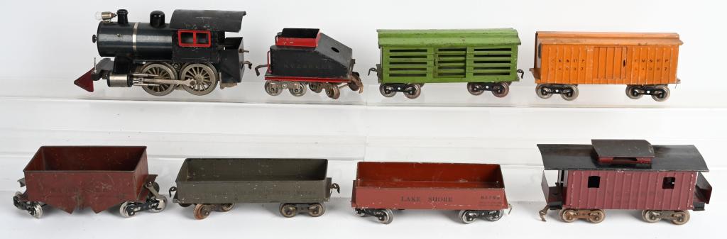 LIONEL STD GA 5 SPECIAL LOCO & TENDER w/ 6 FREIGHT: Original Lionel standard gauge 5 Special Locomotive and Tender. Very good condition missing 1 flag holder, copula on cab, and boiler hand rail. Tender is lettered NYC HRRR. Comes with Rock Island Line