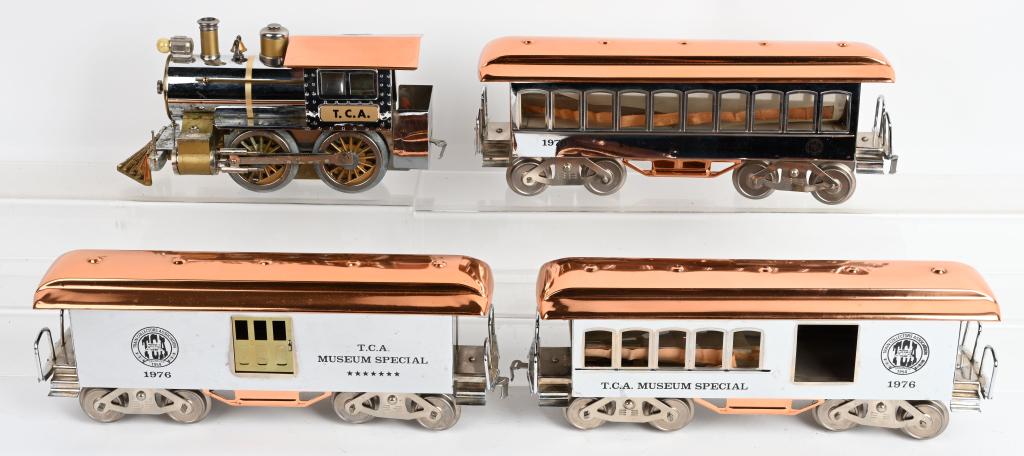McCOY TCA CHIEF ENGINE & 3 TCA PASSENGER CARS: McCoy TCA Little Chief Engine in copper and chrome. has some discoloration on roof. Comes with Pullman Car, and 2 Baggage Cars. Excellent