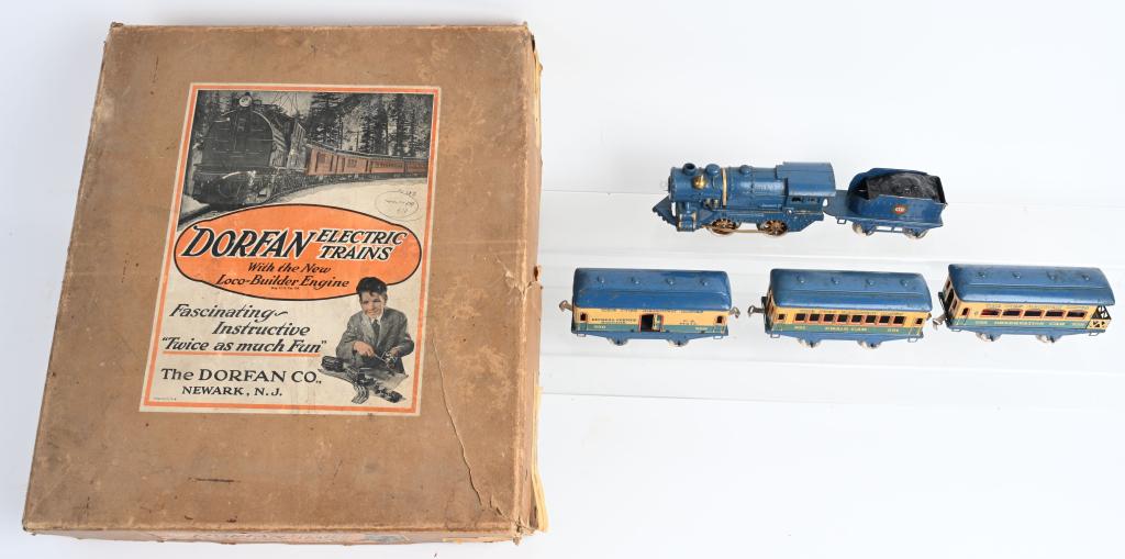 IVES TRAIN SET w/ DORFAN BOX: Ives O Gauge Train Set includes Cast Iron Engine with broken cow catcher, Tender, 550 Baggage, 551 Chair Car, and 558 Observation. Plus Track and Transformer. All housed in an original Dorfan box. Ver