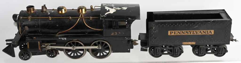 BOUCHER 2222 LOCOMOTIVE & TENDER: Original Boucher 2222 Locomotive and Tender. Engine all original and complete. Has some paint loss. Comes with Pennsylvania Tender that all original and in great shape.