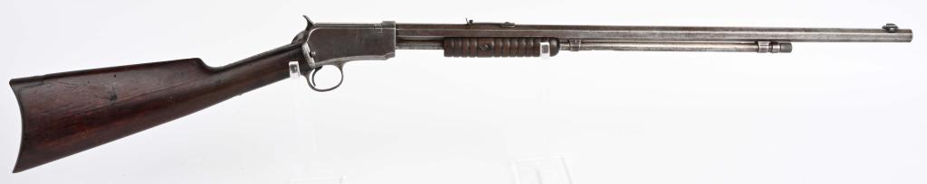 WINCHESTER MODEL 1890 SLIDE ACTION RIFLE: SERIAL 491131. BARREL 24". CALIBER .22 SHORT. MADE IN 1913. Winchester classic features full octagon barrel, tube fed, blue finish, take down, 1901 patent rear sight, replaced front sight, walnut stoc