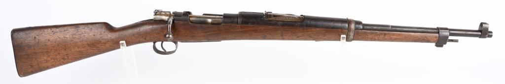 MODEL 98 MAUSER MILITARY CARBINE: SERIAL L1195. BARREL 22". CALIBER 7MM. It is unclear what country this Mauser was made for because beside the serial number, there is no crest or address on frame. Sight is in meters and no other part
