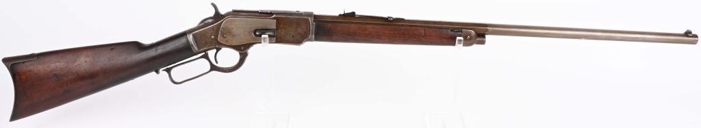 WINCHESTER MODEL 1873 RIFLE 38-40: SERIAL NUMBER 72471 BARREL 26" CALIBER 38-40 MANUFACTURED 1881. Winchester model 1873, 2nd model with 1/2 octagon barrel and magazine modified to Brown magazine length. Straight 2 piece walnut stocks 
