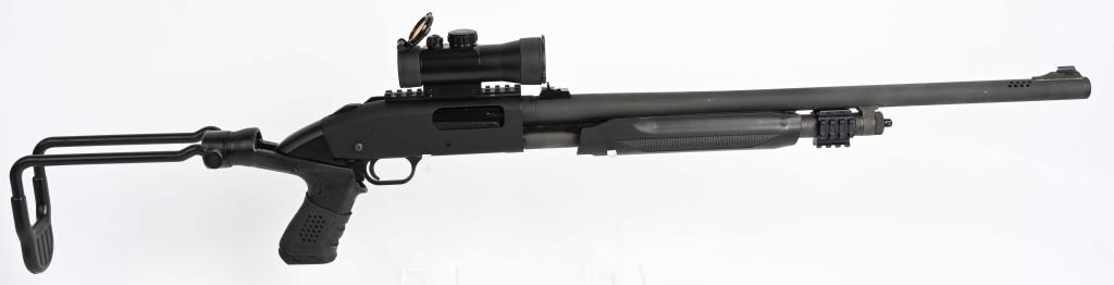 MOSSBERG MODEL 500 A SLIDE ACTION SHOTGUN: SERIAL R69354. BARREL 24". BORE 12. CHAMBER 3" Military style set up with matte finish, vented barrel, rifle sights, Tru-Glo scope, side mount shell holder, folding rear stock, nylon stock with carry