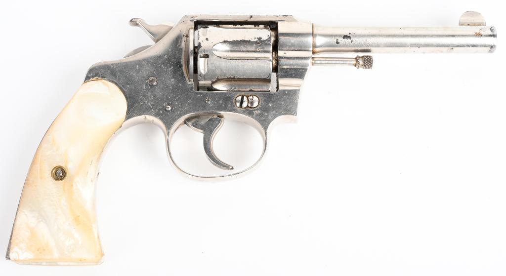 COLT POLICE POSITIVE .32 NICKEL FINISH W / PEARLS: SERIAL NUMBER 181803 BARREL 4" CALIBER .32 NEW POLICE ( 32 S&W) MANUFACTURED 1922 Produced by Colt with 4 inch barrel and Nickel finish. Early small frame Police Positive with 2 piece pearl grips. 6 s