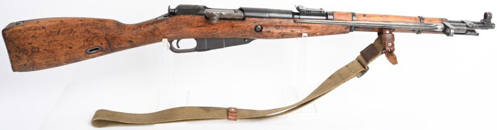 M1891 MOSIN NAGANT CARBINE - 1953: SERIAL BK5324. BARREL 20". CALIBER 7.62 X 54R. Made and dated 1953 on chamber. Numbers match on barrel and frame but other numbers mixed. Import stamped. This is carbine version with short barrel and 