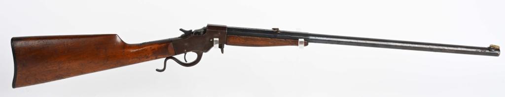 STEVENS FAVORITE .22 BOYS' RIFLE: SERIAL NUMBER L744, BARREL 22", CALIBER .22LF MANUFACTURED 1893-1939. Lever action break top action with takedown feature. Octagon / round barrel, Rocky Mountain front sight and folding rear sight. Re