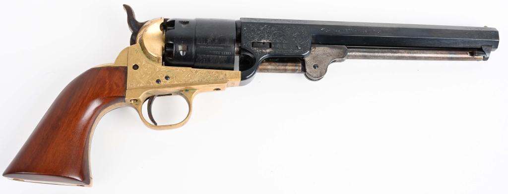 ENGRAVED 1851 COLT NAVY REPLICA REVOLVER: SERIAL 348719. BARREL 7.5". CALIBER .44 Made by Pietta of Italy. Features octagon barrel, brass frame, walnut grips, cut for shoulder stock. Engraving is found on barrel, frame and back strap. Gun is 