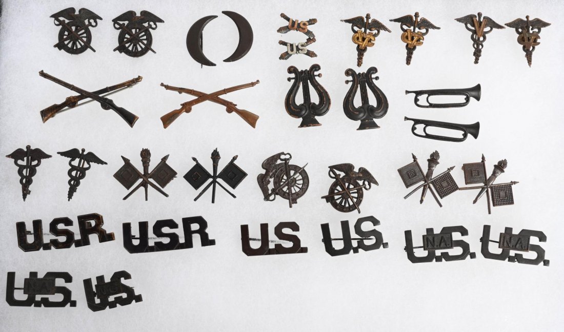 WW1 US OFFICER COLLAR INSIGNIA SETS LOT OF 15: WWI US Officer Collar sets of Insignia to include 1) Quartermaster Corps 2) Commissary 3) Shirt Artillery US devices 4) Veterinary Corps 5) mismatched Veterinary Corps 6) Infantry 7) Band Leader 8) Bu