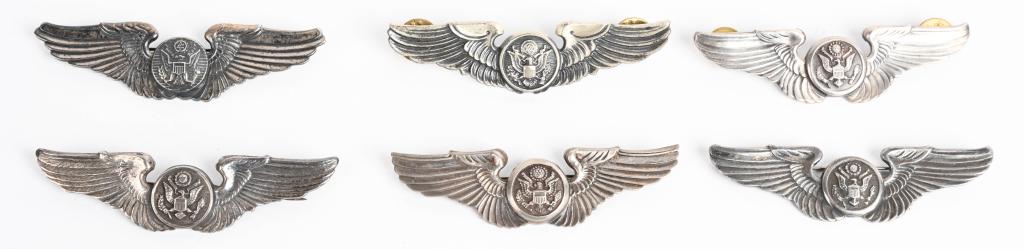 WWII US ARMY AIR CORPS WINGS LOT OF 6 WW2: WWII US Army Air Corps wing lot to include 1) 3 Inch pin backed Air Crew marked to the reverse American Emblem Utica NY Sterling 2) 3 Inch pin backed Air Crew Marked STERLING 3) 3 Inch pin backed Air 