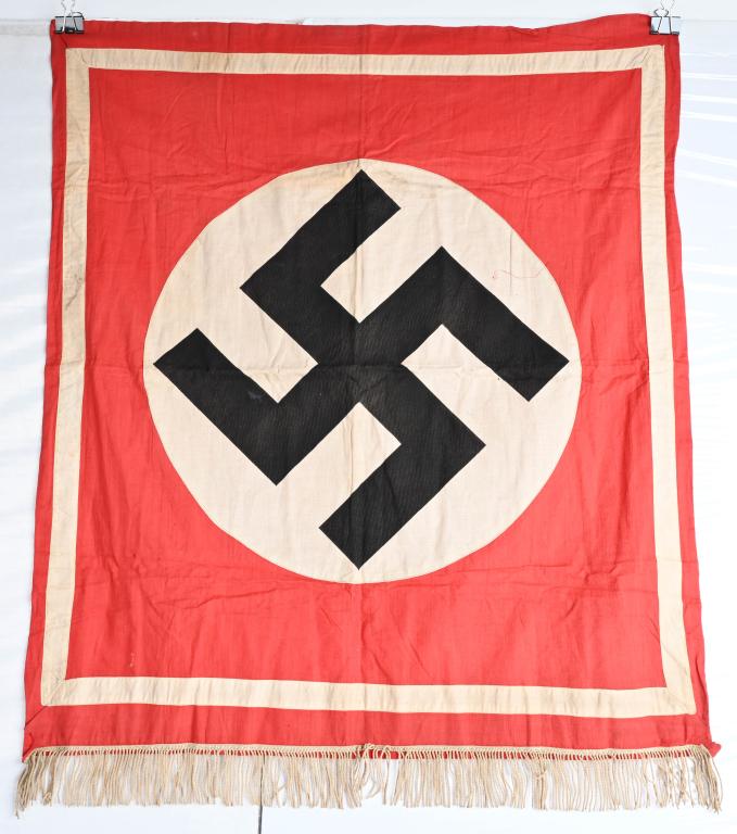 WWII NAZI GERMAN PODIUM BANNER - FLAG WW2: One sided two piece podium banner with white silk border and fringe along the bottom. The 3 attachment rings are missing. No rips tears or stains. Flag, including fringe measures 28" x 32". excellent.