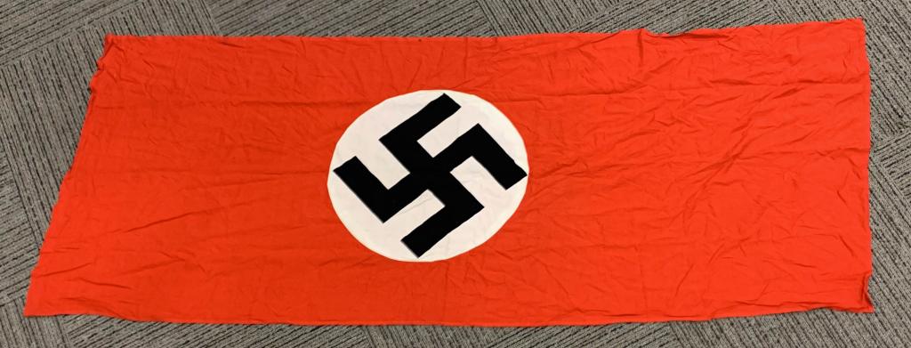 WWII NAZI GERMAN NATIONAL PARTY FLAG WW2: Large multi-piece cotton construction banner approximately 31 x 78 inches. To both its red fields are sewn an white disks with a printed mobile swastikas in black. Shows the expected period wear but o