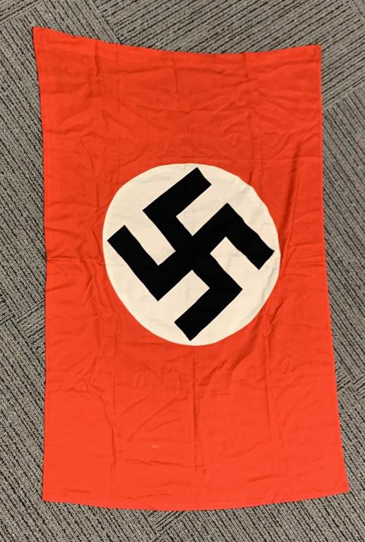 WWII NAZI GERMAN NSDAP NATIONAL FLAG WW2: Multi-piece cotton construction banner approximately 31X46 inches. To both its red fields are sewn diameter white disks, with a printed mobile swastikas in black. Shows the expected period use and wea