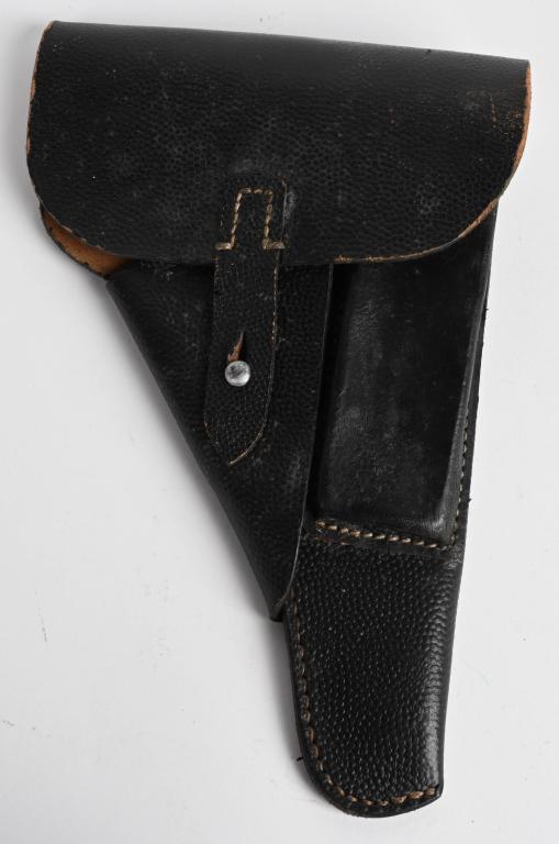 WWII NAZI GERMAN P-38 LEATHER HOLSTER 44 DATED: WWII German P38 breakaway holster that is marked with the model designation on the back along with the manufacturer code “cxb 4” for production by Moll Lederwarenfabrik in 1944. Leather is soft an
