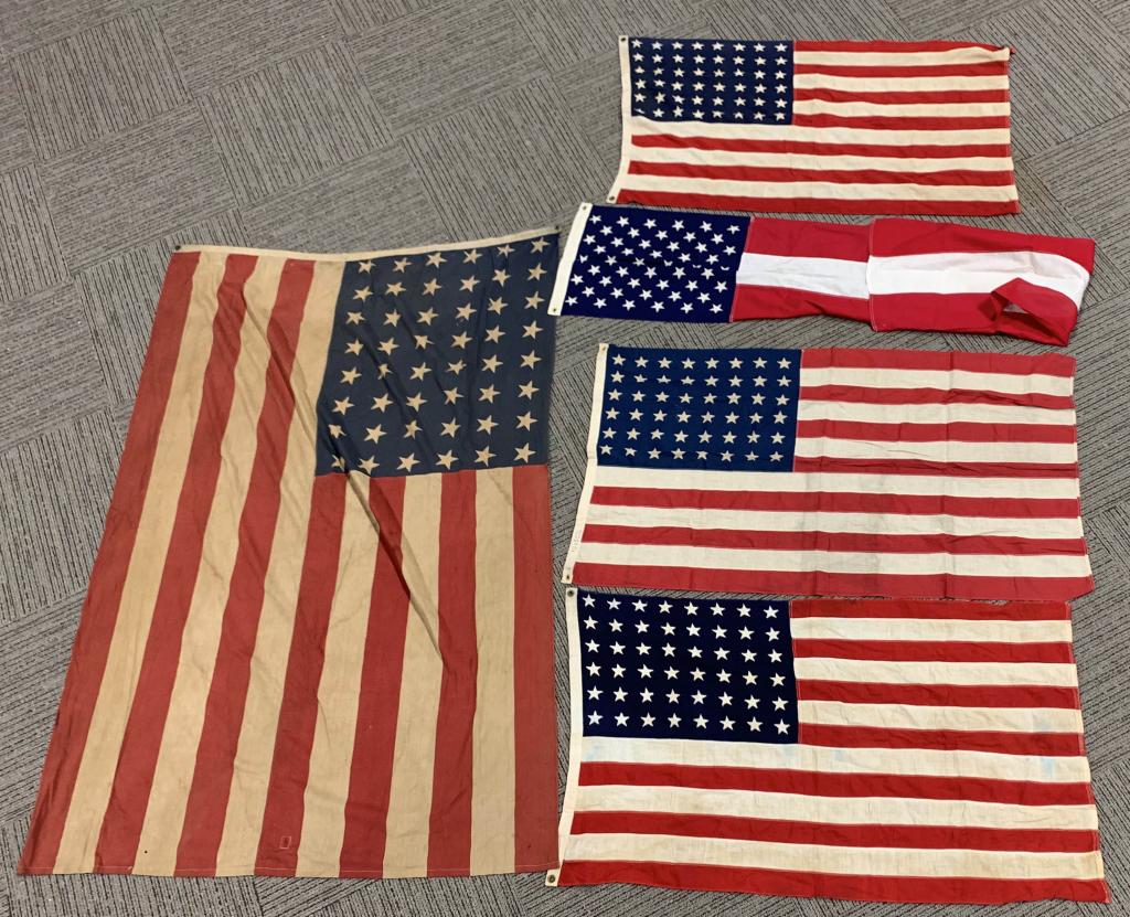 5 PC. LOT 48 + 50 STAR US FLAGS: 5 early US flags, 4 48-star and 1 50-star. 3x5 and larger. Some show age discoloration and wear. Very Good