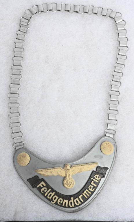WWII NAZI FELDGENDARMERIE SERVICE DUTY GORGET: Multi-piece construction both the gorget and the chain are made entirely of die-stamped steel magnetic aluminum-coated spread-winged Army eagle and both buttons are painted in a white radium paint gra