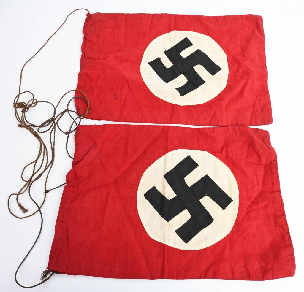 WWII NAZI GERMAN NSDAP WALL FLAG LOT OF 2 WW2: Multi-piece cotton construction flags approximately 9 x 13 inches. To both its red fields are sewn white disks, with a multi piece mobile swastikas in black. Shows the expected period use and wear but