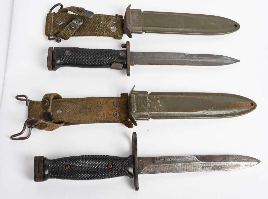 U.S. MODEL M7 BAYONET & SCABBARD LOT OF 2: The M-7 bayonet was introduced in 1964, when the M16 entered service during the Vietnam War. These two bayonets measure 11 1/2" overall with 6 1/2" carbon steel blade. Very Good