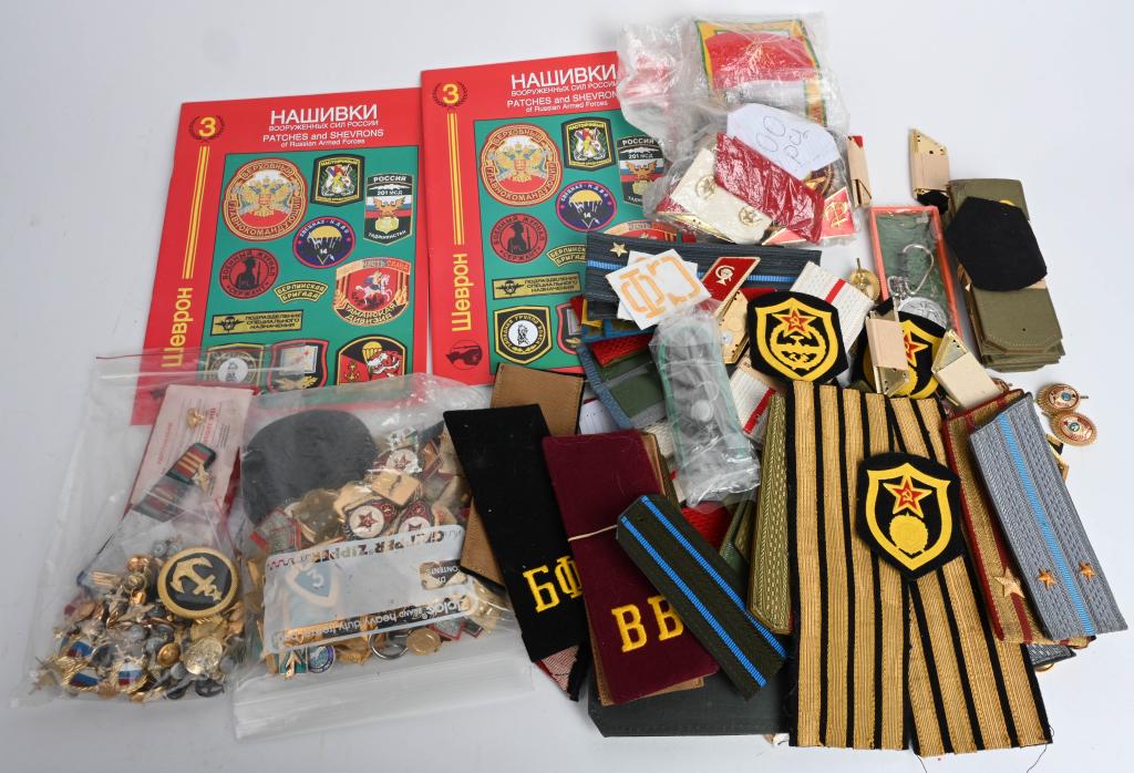 SOVIET MILITARY SHOULDER BOARDS PINS BADGE LOT 400: Large lot of Soviet military items to include Shoulder Boards, patches, pins, badges, buttons, key chains and a tie clip. This lot contains roughly 400 items.