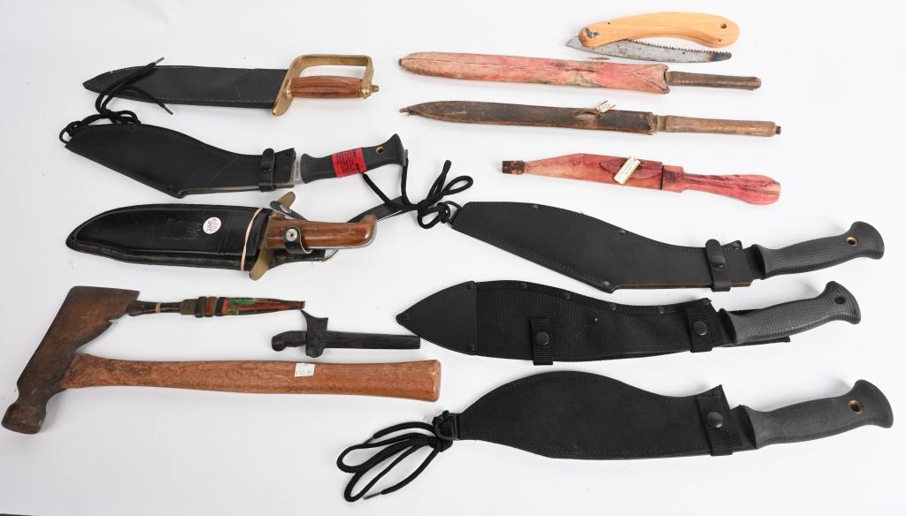 LARGE KNIFE COLLECTION WITH AFRICAN & NEW GURKHAS: Large collection of large knives to include 4 Gurkha's, 1 Pakistan marked Bowie knife, 1 hatchet, 1 small tree saw, 1 D guard Bowie, 5 Tribal Knives.