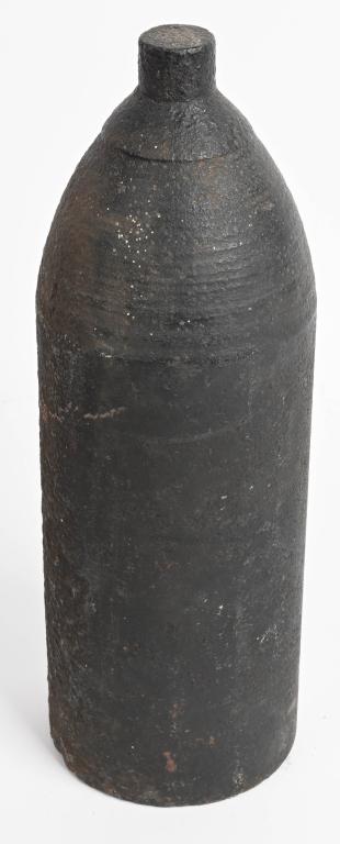 19th CENTURY HEAVY ARTILLERY BOLT: Heavy artillery bolt measures 17 1/2" by about 6" diameter, and weighs 93 pounds. Has ground action. Inert, Very Good