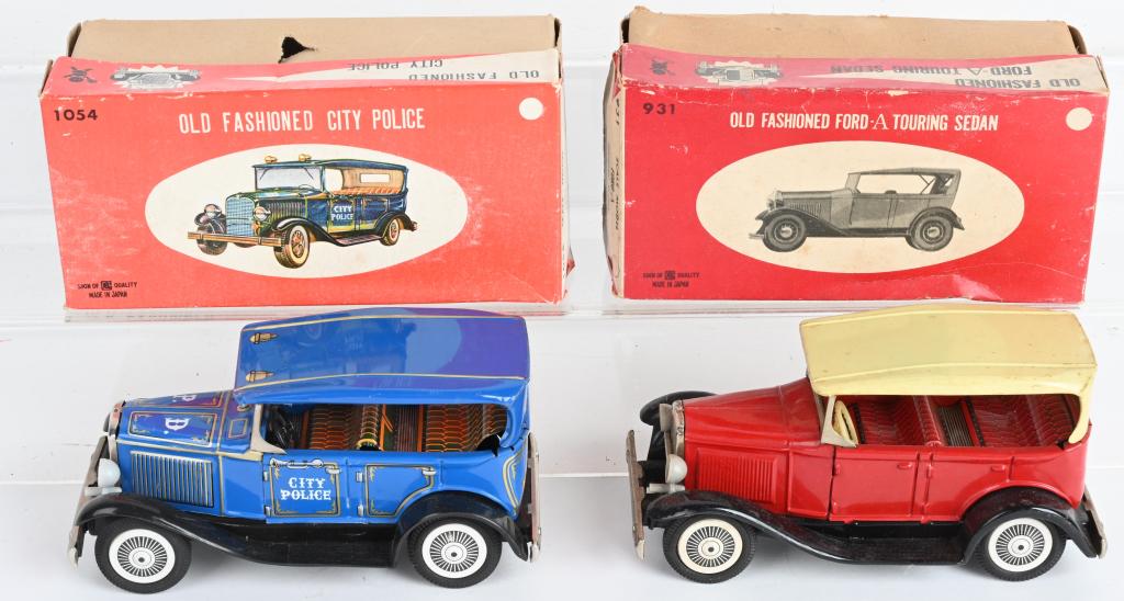 2- BANDAI OLD FASHIONED CARS w/ BOXES: Pair of Japan tin friction Old Fashioned Cars. Includes City Police Car and Ford A Touring Sedan. Both all original. Boxed 7" Excellent