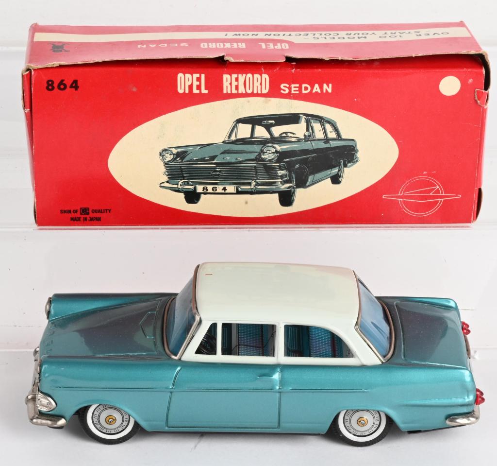 BANDAI OPEN REKFORD SEDAN w/ BOX: Japan tin friction Opel Rekford Sedan. Blue with white top. New Old Stock condition. Boxed. 8" Excellent