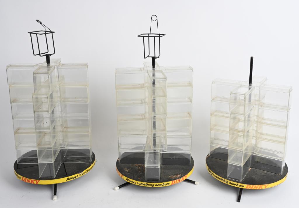 3- DINKY TOYS STORE DISPLAYS: Lot of 3 original Dinky Store Displays. 2 Displays complete with 6 shelves each holds 4 cars. Plus has holders for literature on top. 3rd Display only has 5 shelves and missing holder. All have Dinkt
