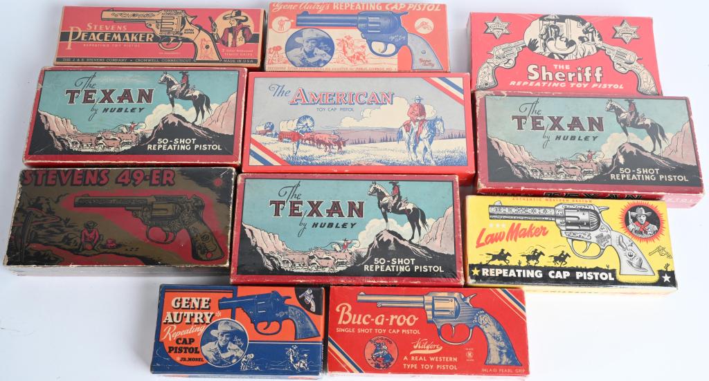 11- ORIGINAL CAP GUN BOXES: Includes 3 Texan, Buc-A-Roo, 2 Gene Autry, American, Sheriff, Law Maker, Stevens 49er, and Peacemaker. Nice original boxes