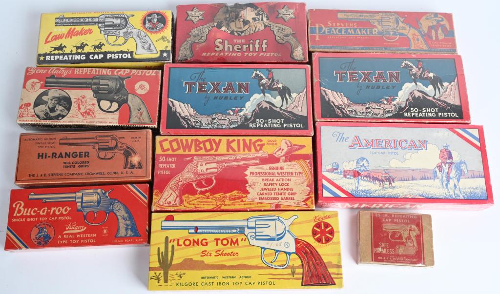 12- ORIGINAL CAP GUN BOXES: Includes 2 Texan, 2 Gene Autry, Peacemaker, Sheriff, Long Tom, American, Cowboy King, Buc-A-Roo, Hi-Ranger, and 25 Jr. Nice original boxes