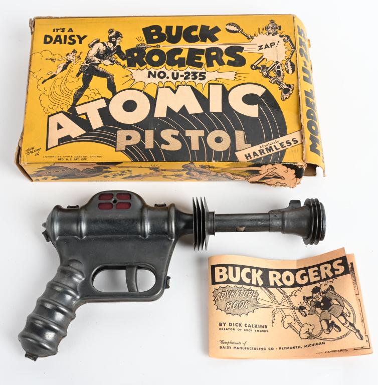VINTAGE DAISY BUCK ROGERS ATOMIC PISTOL w/ BOX: Pistol is on original condition. It pops but does not spark. Includes graphic original box and comic insert. 10", Very Good