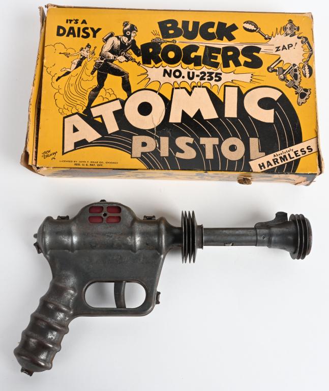 VINTAGE DAISY BUCK ROGERS ATOMIC PISTOL w/ BOX: Pistol is on original condition. It pops but does not spark. Includes graphic original box . 10", Very Good