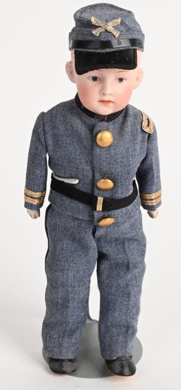 10" HUEBACH BISQUE BOY CONFEDERATE CIVIL WAR DOLL: This little fellow measures 10" tall with bisque head that features painted blue eyes and closed mouth that is stamped 2/0. His body is cloth with bisque hands and he is wearing the uniform of the con