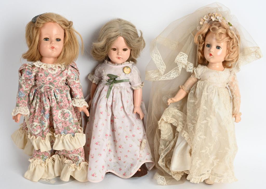 LOT (3) ANN SHIRLEY & WENDY COMPO DOLLS: Two of these dolls are marked Effanbee and are the Ann Shirley type while the third doll is marked Madame Alexander and is supposed to be Wendy Ann, She is dressed in a wedding gown while other two ar