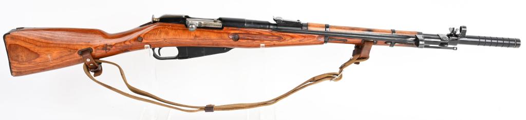 RUSSIAN MODEL 1944 CARBINE BY IZHEVSK 1944: SERIAL NUMBER AH5344 BARREL 20" CALIBER 7.62X54R MANUFACTURED 1944. Produced by Izhevsk Arsenal in 1944 with laminated stocks and folding spike bayonet. Carbine is further fitted with US grenade proje