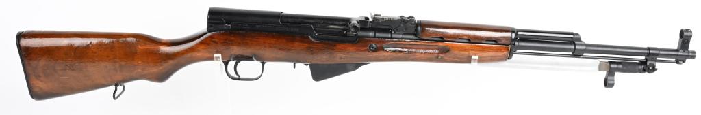 RUSSIAN 1955 PRODUCTION SKS RIFLE W/ BLADE BAYONET: SERIAL NUMBER YO4826 BARREL 20" CALIBER 7.62X39 MANUFACTURED 1955. Produced in in 1955 and later arsenal rebuilt. with forced matched numbers on stock and rebuild marking on butt. Black epoxy finish w