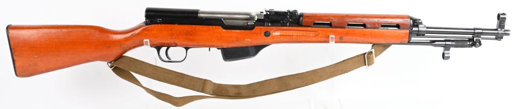 RARE ALBANIAN SKS RIFLE WITH SLING: SERIAL NUMBER 01714-78 BARREL 20-1/2" CALIBER 7.62X39 MANUFACTURED 1978. Produced under license from China the Albanian SKS rifle with 14" blue finished cruciform folding bayonet, 9" extended wood han