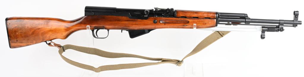 RUSSIAN M45 SKS RIFLE W/ BLADE BAYONET & SLING: SERAIL NUMBER AM1999N BARREL 20" CALIBER 7.62X39 MANUFACTURED 1950'S. Produced in Russia with Arctic Birch stocks, blue finish and folding blade bayonet. Chrome lined bore and 10 round drop magazine. 