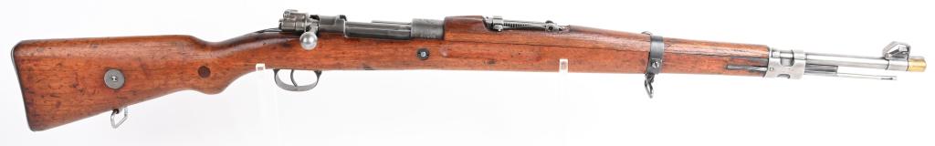 YUGOSLAVIAN MODEL M24/52-0 RIFLE: SERIAL NUMBER P14517 BARREL 23-1/2" CALIBER 8X57 MAUSER. MANUFACTURED 1952. Produced in Yugoslavia and based upon the K98 German infantry rifle, Walnut stock with handguard with slide adjustable rear