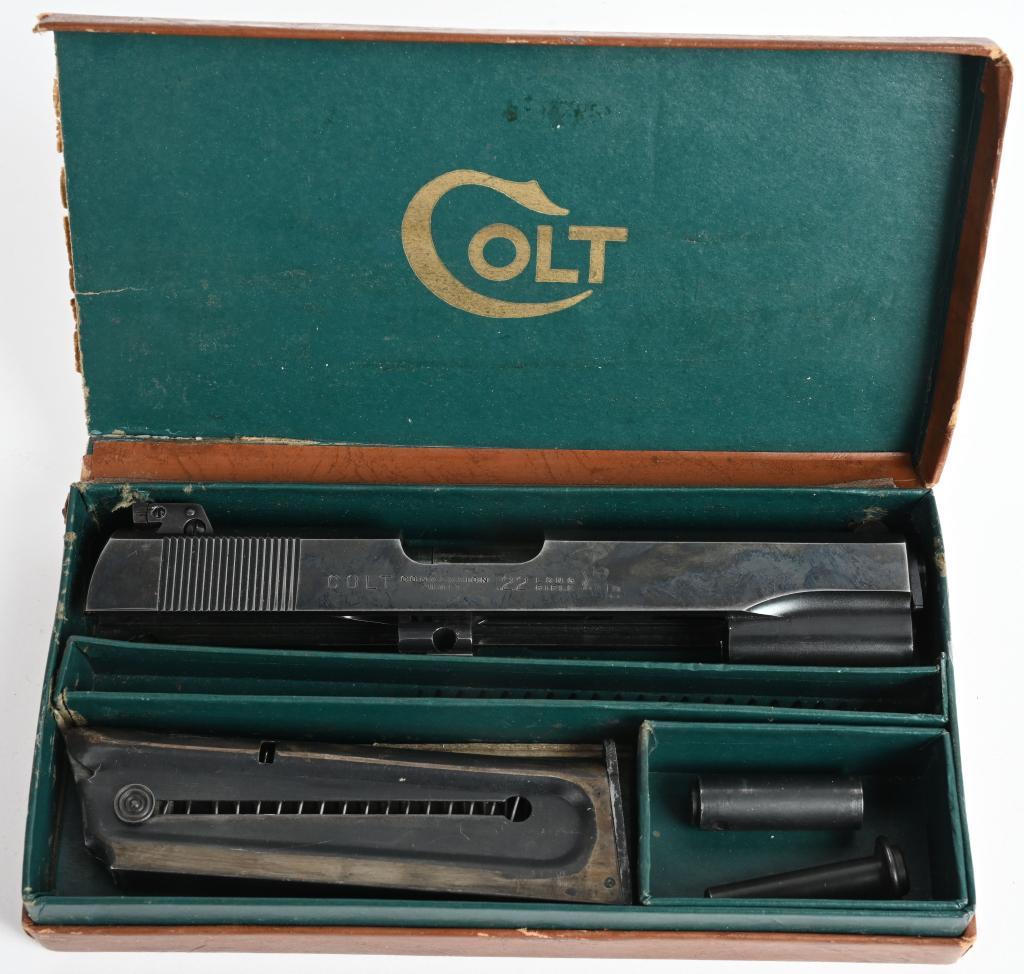 BOXED 1950'S COLT 1911 .22 CONVERSION KIT: These early post war kits have a higher polish factory blue finish than later two piece box sets. Comes with correct magazine, slide. This set has been used and has overall high edge wear but still so