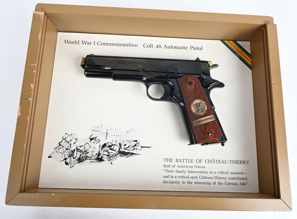CASED COLT 1911 WWI CHATEAU THIERRY PISTOL: SERIAL 6332-CT. BARREL 5" CALIBER .45 ACP. This is one of a set of (4) Colt 1911 WW1 Commemorative pistols. These four pistols completed a set of Colt 1911’s WW1 Commemoratives for Allied WW1 battle