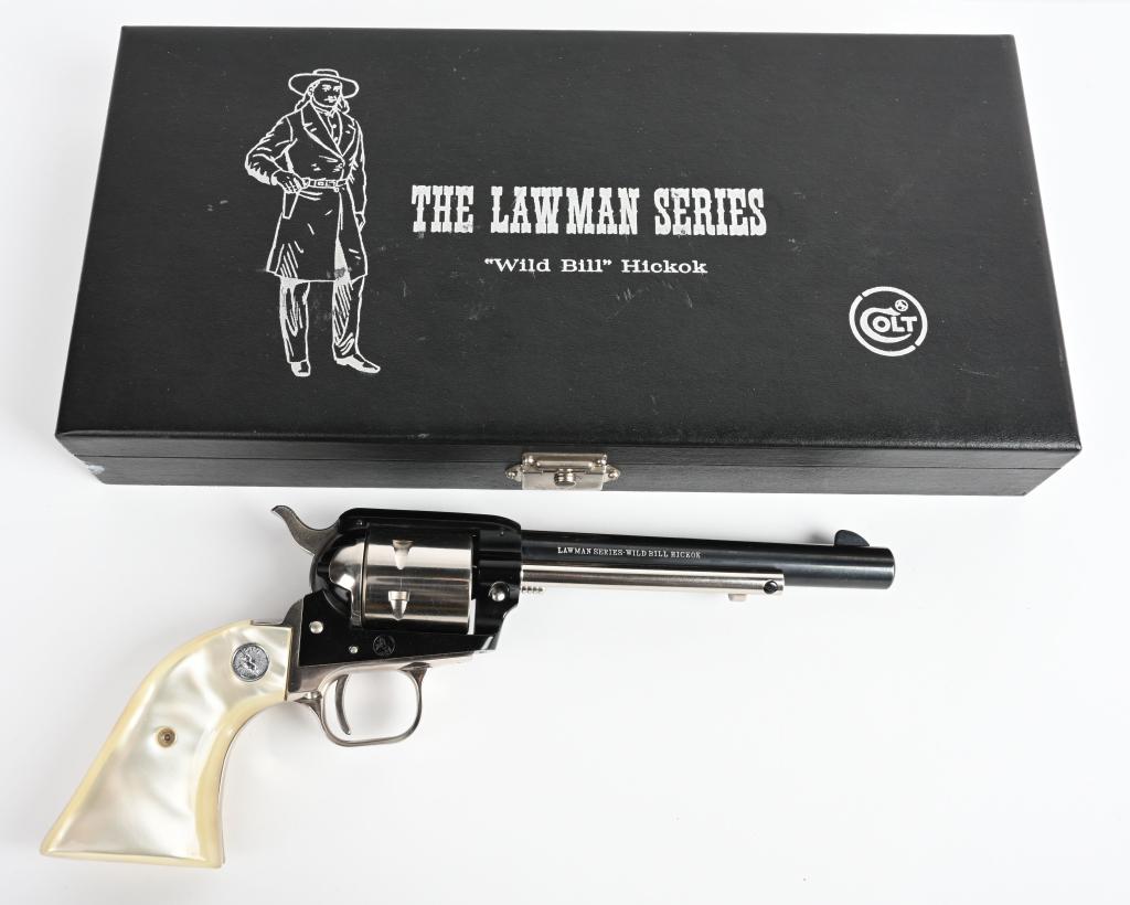 CASE COLT WILD BILL HICKOCK LAWMAN SERIES REVOLVER: SERIAL 2198WB. BARREL 6". CALIBER .22 LONG RIFLE. One of 3000 made in 1969. Gun is a Single Action Frontier Scout, six shot non-fluted nickel plated cylinder, nickel plated trigger guard & back strap,