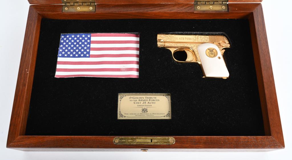 CASED COLT 1908 AIR FORCE TRIBUTE PISTOL: SERIAL 1681. BARREL 2". CALIBER .25ACP. Produced by American Historical Foundation in their military tribute series. It is a Colt Model 1980 semi auto that they restored with new gold plating, nearly 